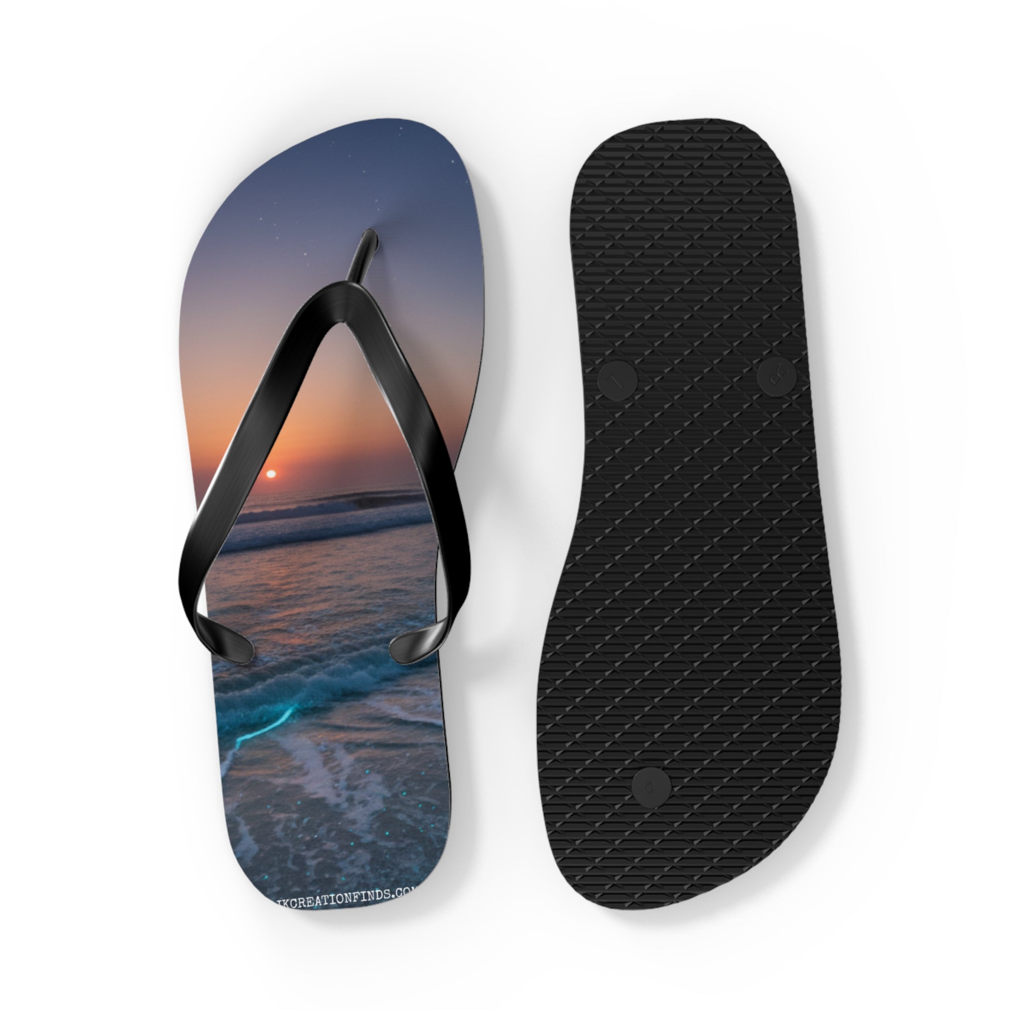 Flip-flops with a sunset ocean wave design and a black sole.