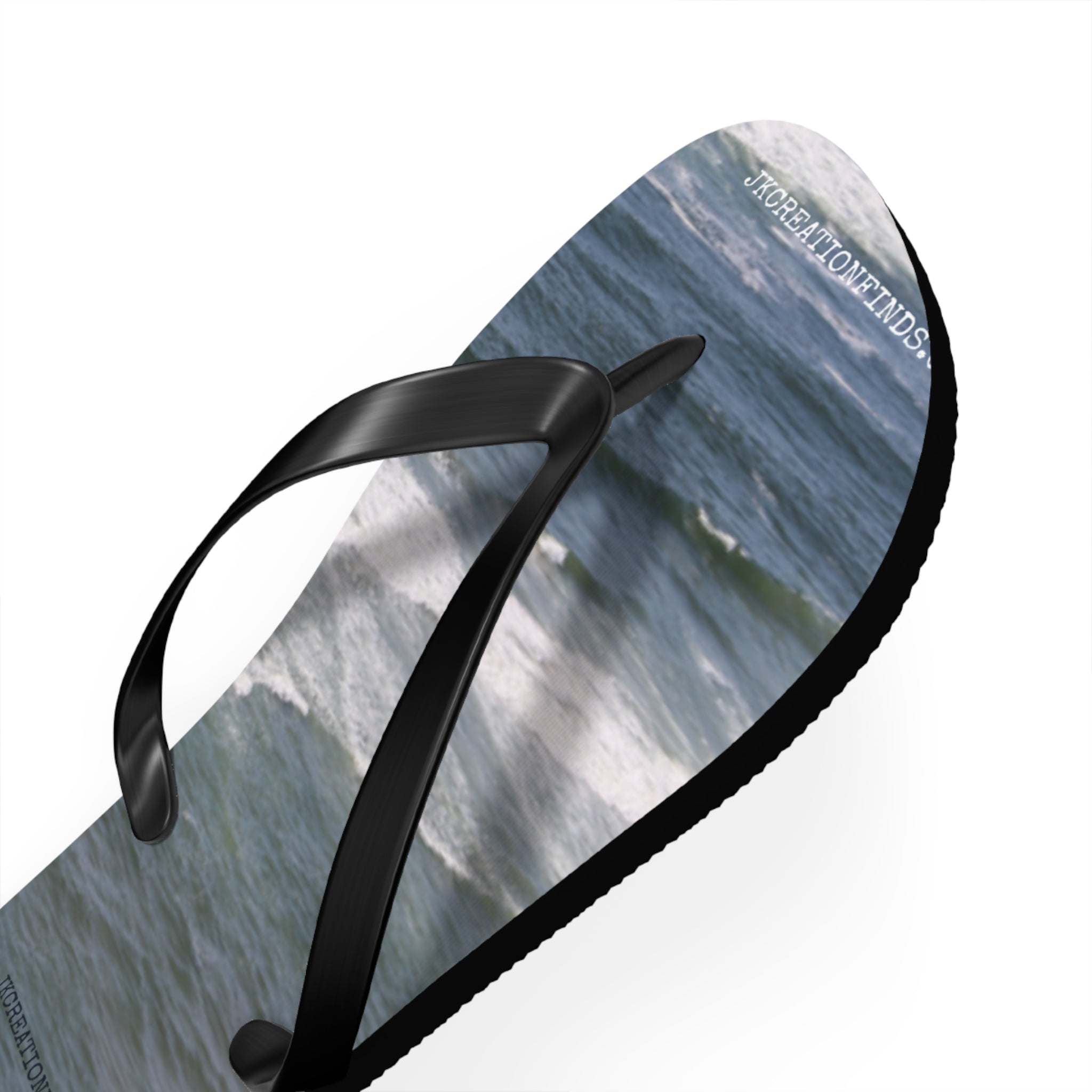 Flip-flops with ocean waves and "JACREATIONFINDS." text.