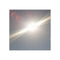 Sun's glare creating a bright lens flare against a hazy sky.