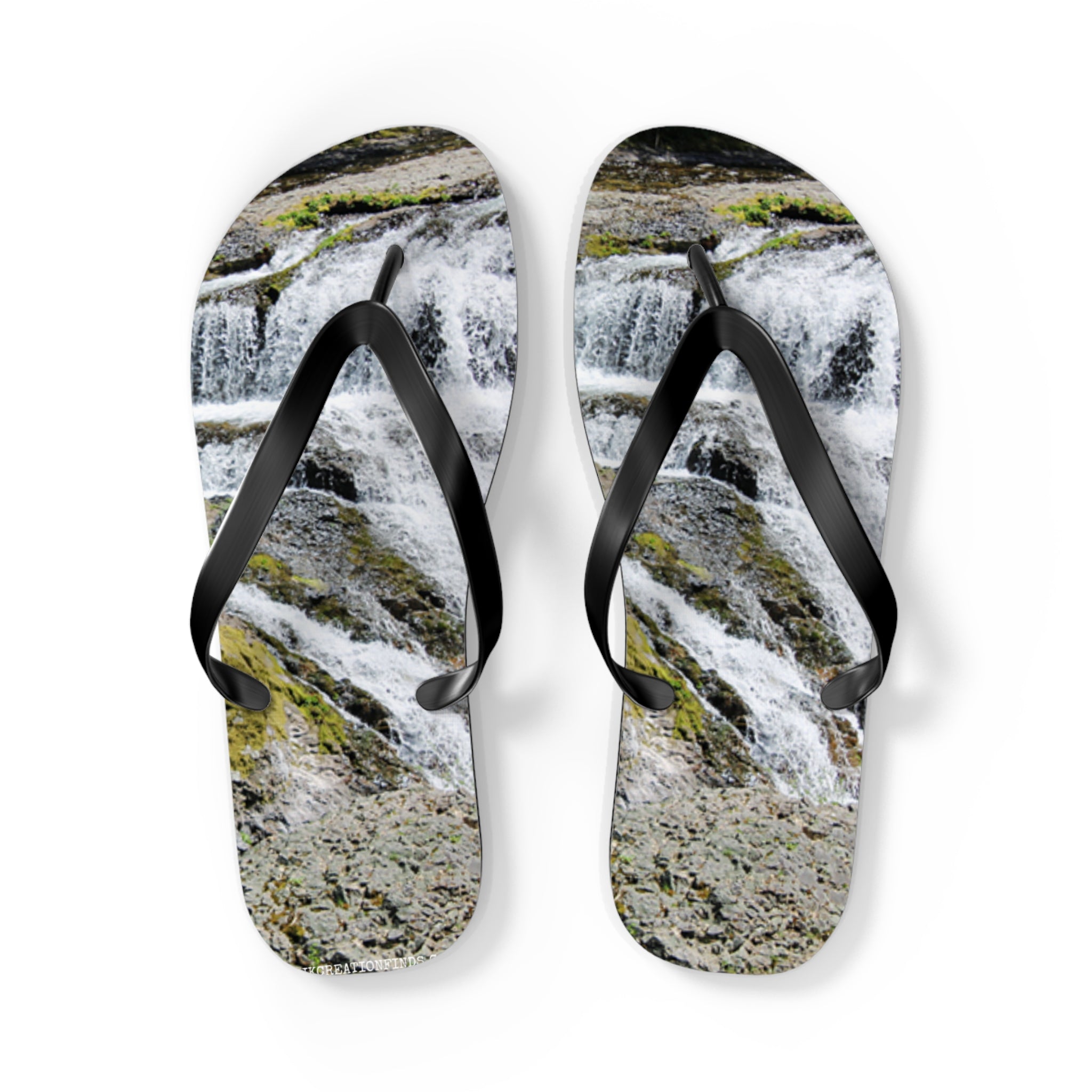 Flip-flops with a cascading waterfall pattern and black straps.