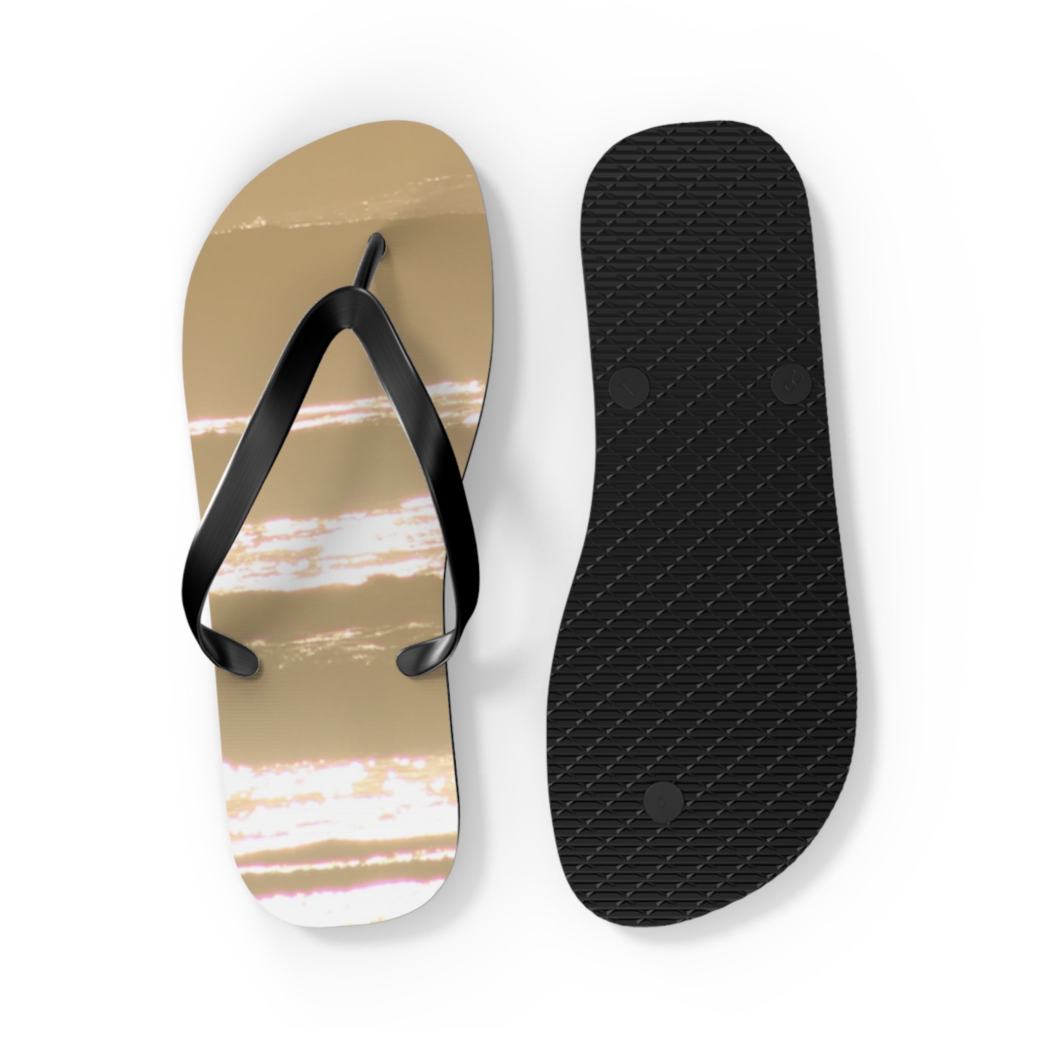 Tan flip-flops with cloud pattern on one sole, black straps.