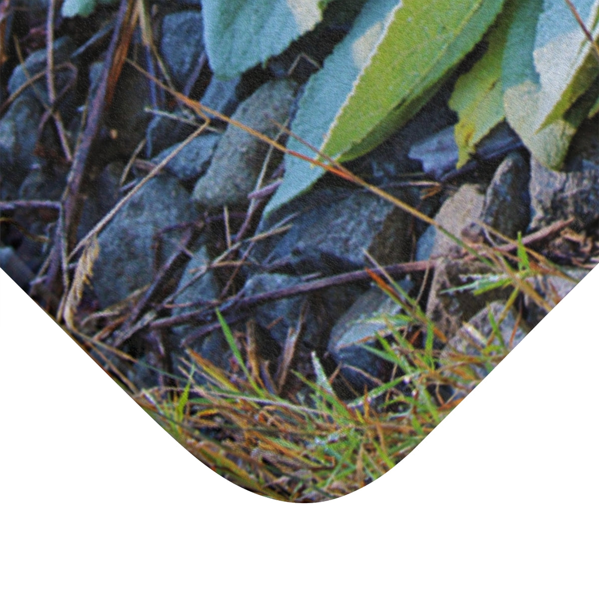 Corner of Rug with Gravel and Leaves Print Design