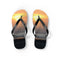 Flip-flops with a sunset ocean scene on the soles.