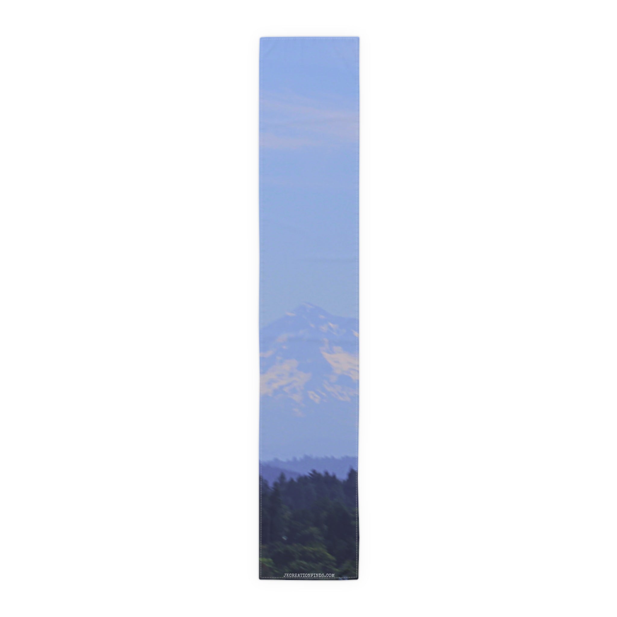 Scarf with a soft focus mountain landscape in blues and greens.