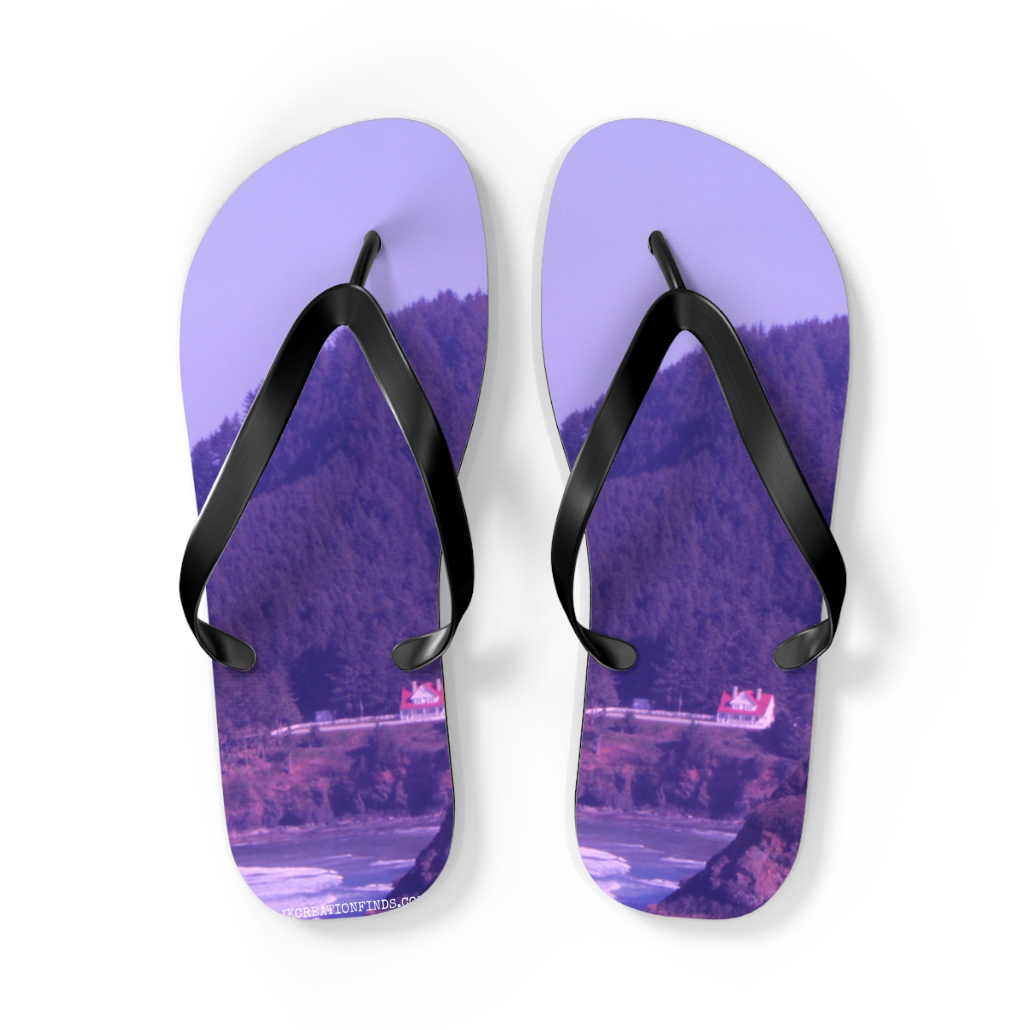 Purple flip-flops with a coastal landscape of houses and trees.