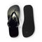 Black flip-flops with a shadowy tree line and moon graphic.