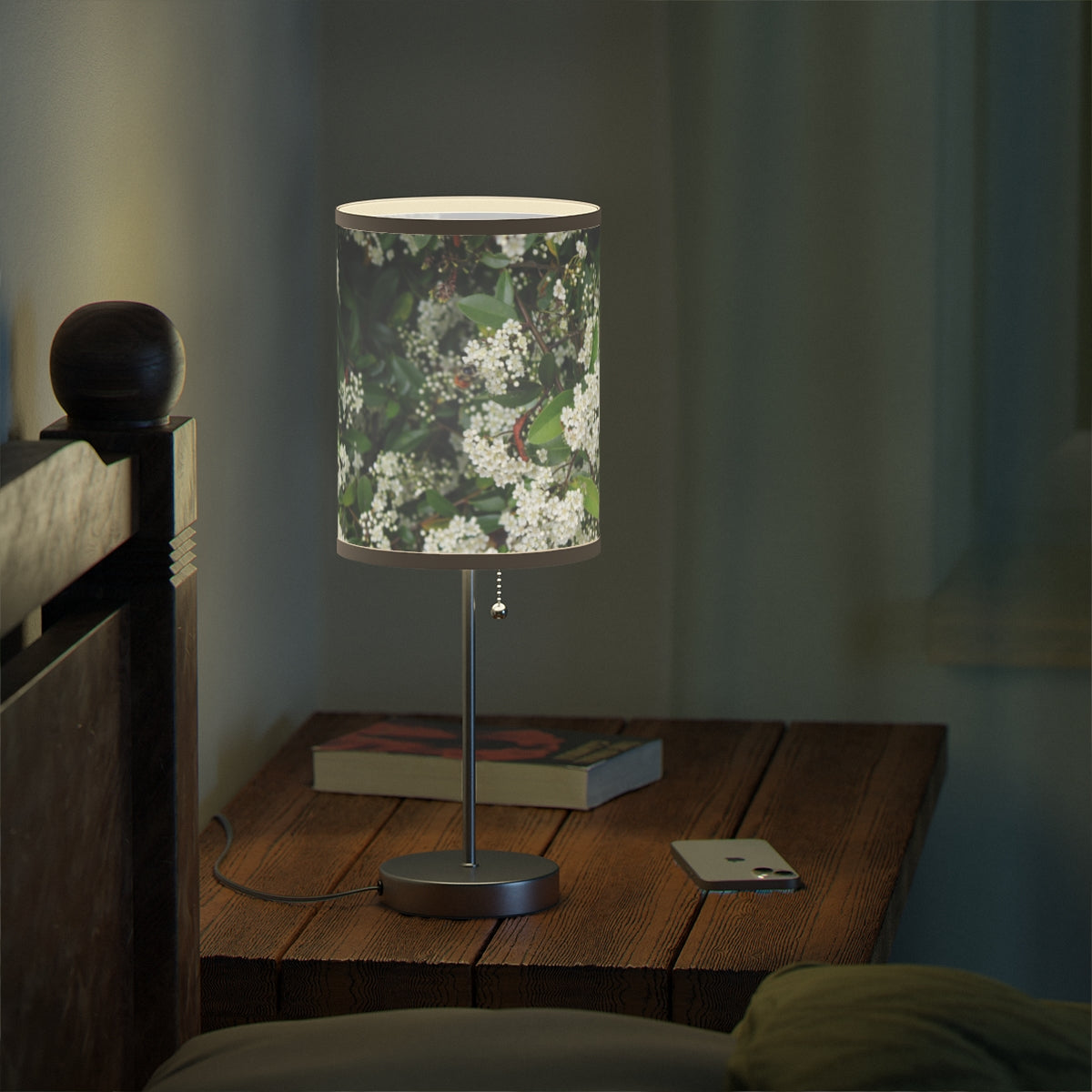 Floral Patterned Lamp Illuminating Nightstand Decor