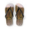 Flip-flops with a forest and lake scene on the soles.