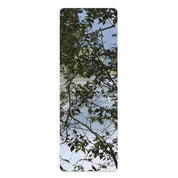 Leafy Tree Branches Over Water Yoga Mat product