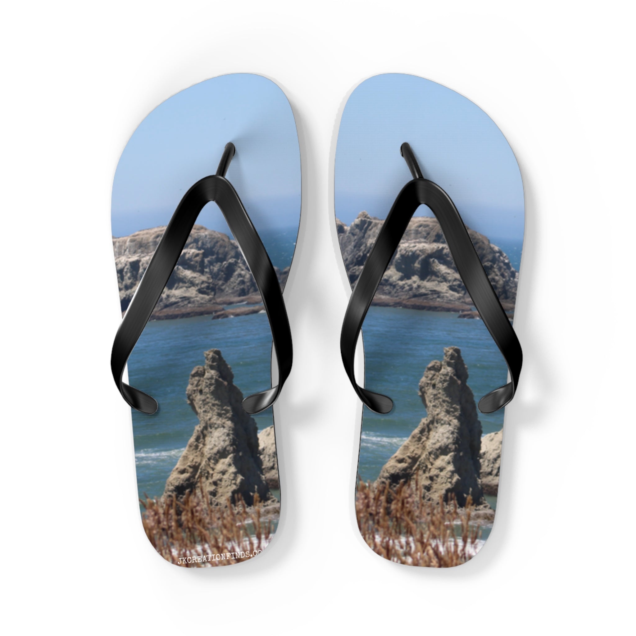 Flip-flops with ocean rock formations and dry grass design.