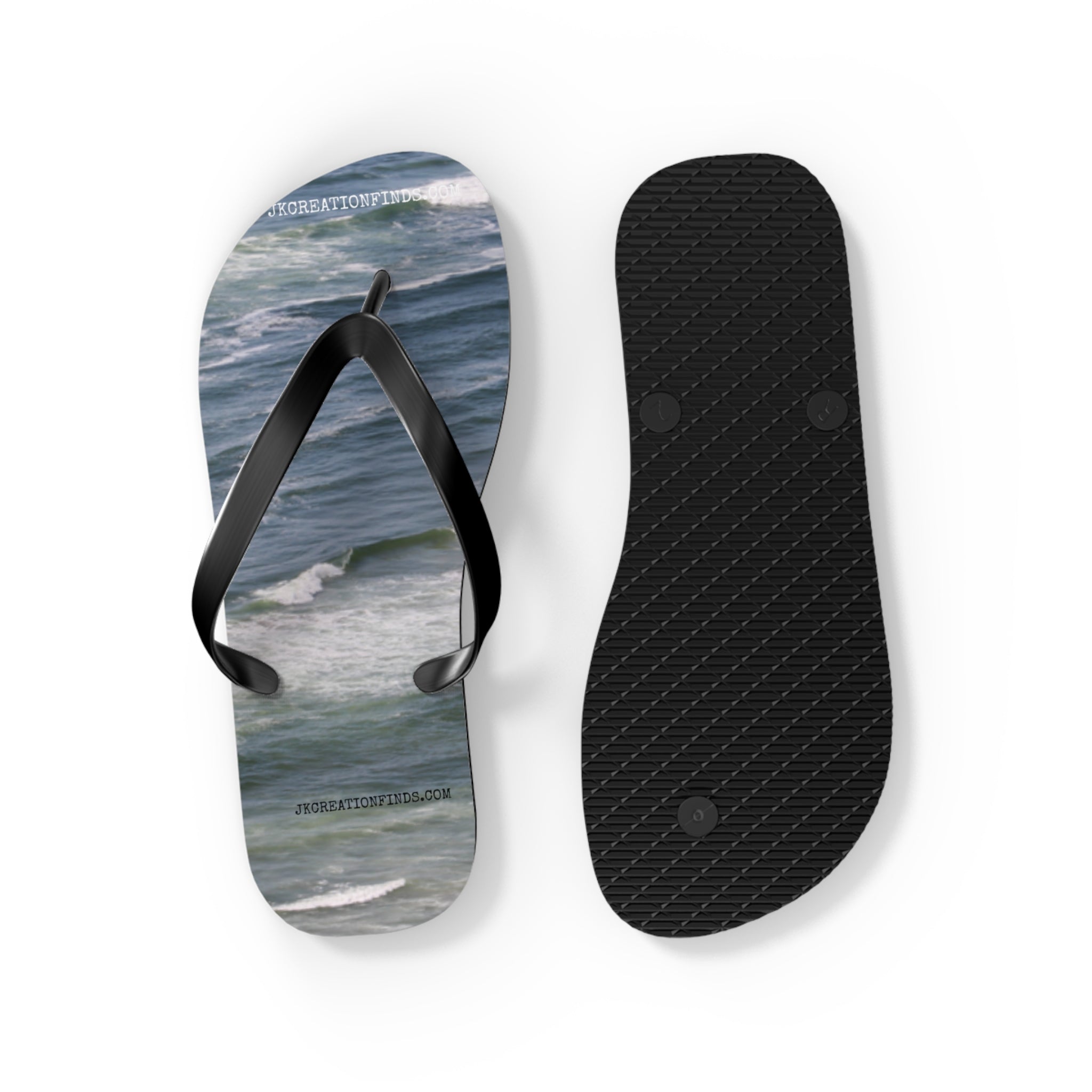 Flip-flops with ocean wave design and textured sole.